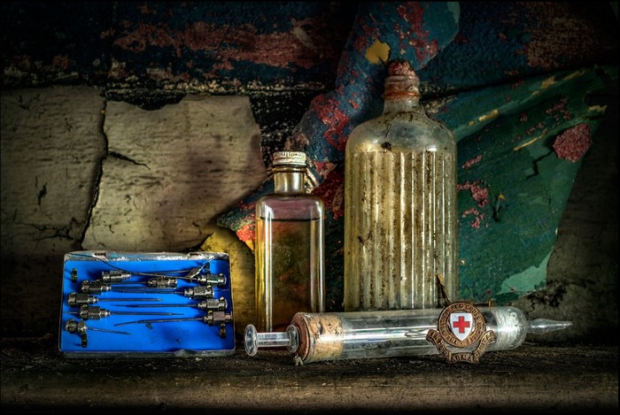 Vintage medical supplies with Red Cross emblem