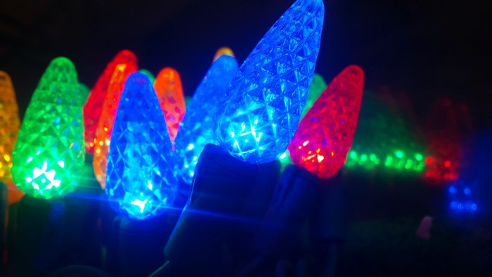 Close-up of colorful Christmas lights at night
