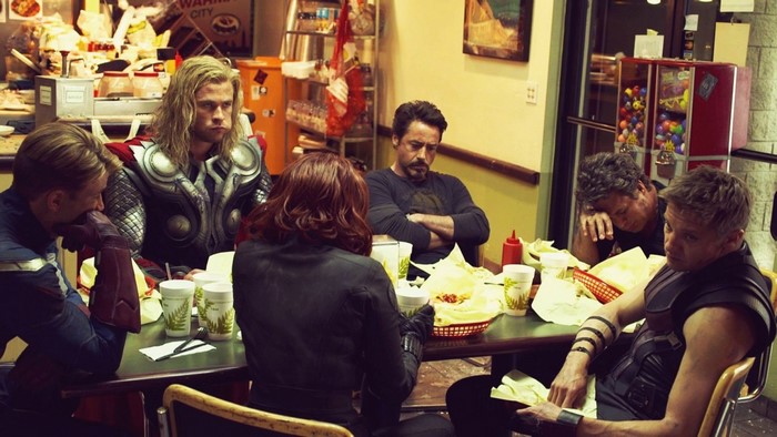 The Avengers eating shawarma at a restaurant