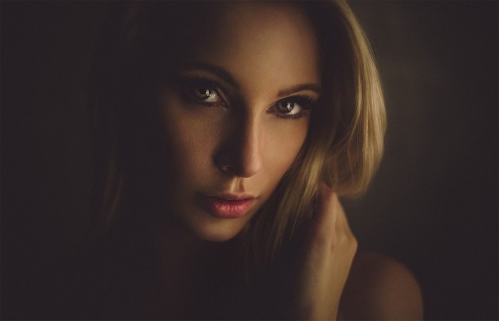 Woman with blonde hair in a close-up portrait