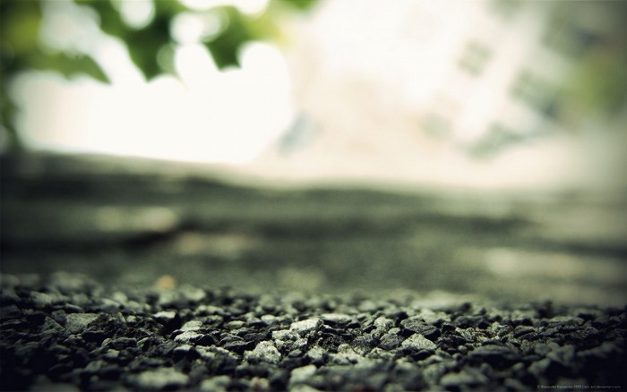 Close-up of gravel with blurred background
