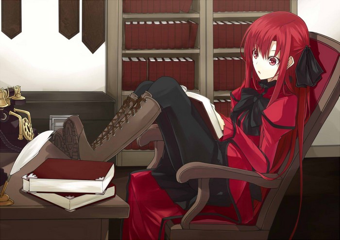 Kushia Microphylla reading a book in a library