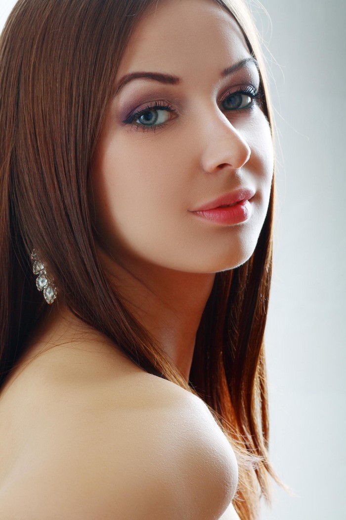 Close-Up Portrait of a Woman with Long Brown Hair