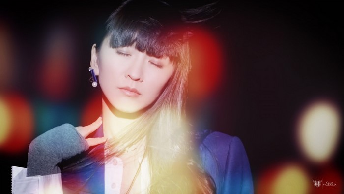Perfume singer Yuka Kashino with colorful lights