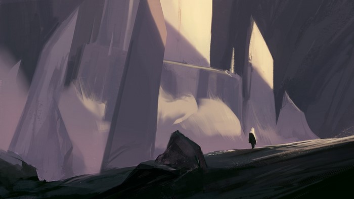 A lone figure walks through a rocky, abstract landscape.