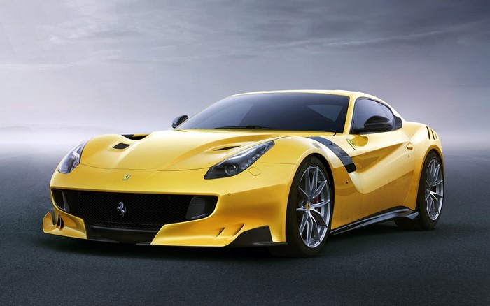 Yellow Ferrari F12 TDF sports car