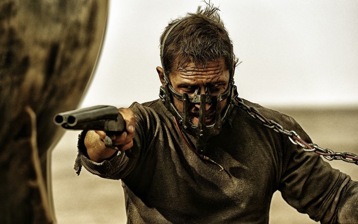 Max Rockatansky from Mad Max: Fury Road holding a shotgun