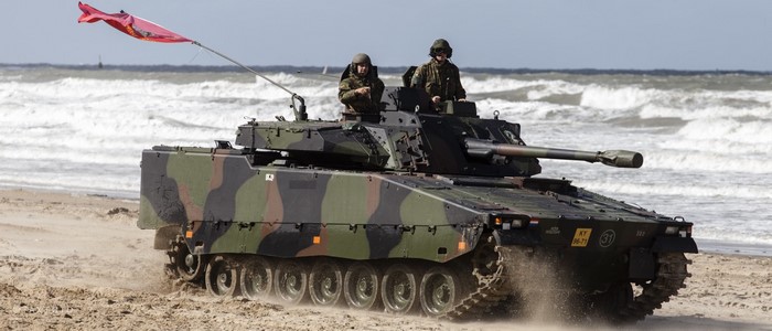 CV90 Armored Vehicle with Soldiers on a Beach