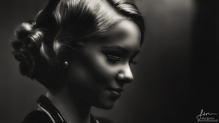 Monochrome portrait of a woman with vintage hairstyle