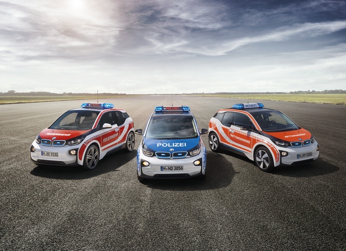 Three BMW i3 emergency vehicles on asphalt