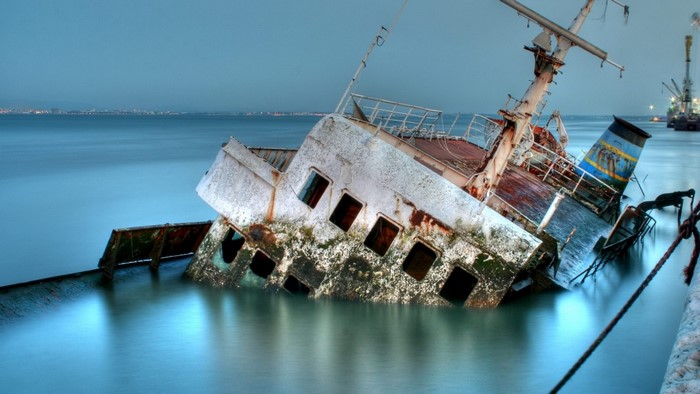 Sunken ship in the sea with long exposure