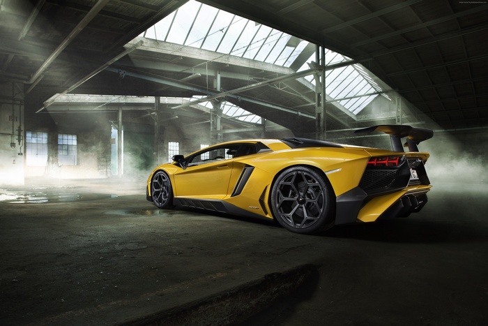 Yellow Lamborghini Aventador Superveloce in warehouse