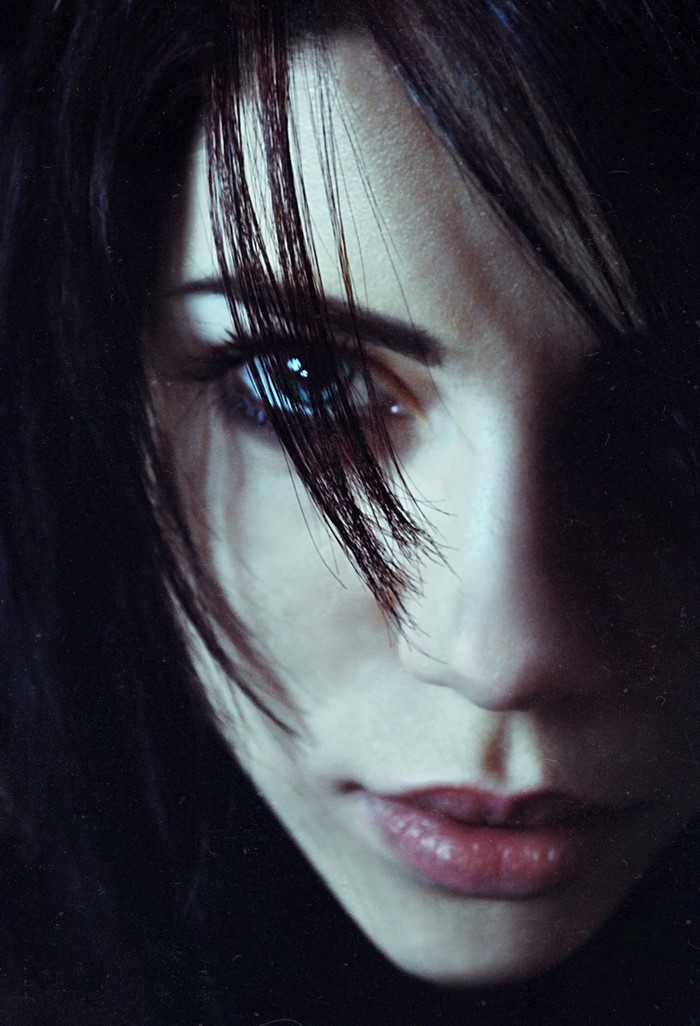 Close up of a woman's face with dark hair