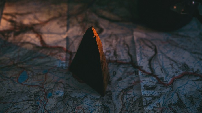 Rock on a map with light and shadow
