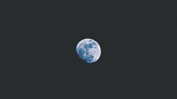 Full moon in a dark sky