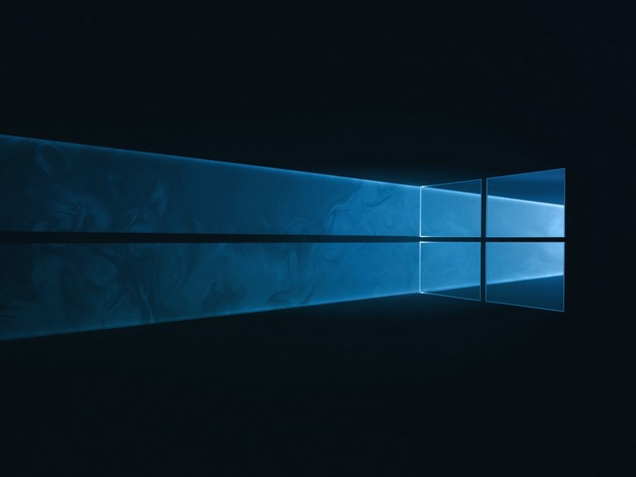Windows 10 logo with blue light and smoke effect