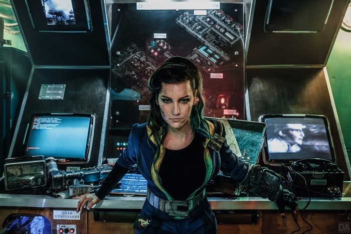 Cosplayer dressed as Fallout Vault Dweller in control room
