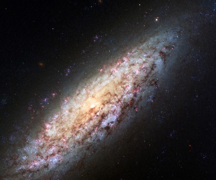 Spiral galaxy with bright core and star-forming regions