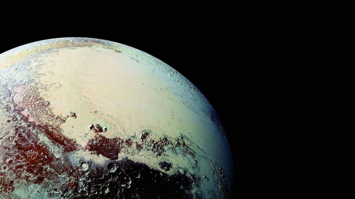 Pluto's surface with mountains and plains