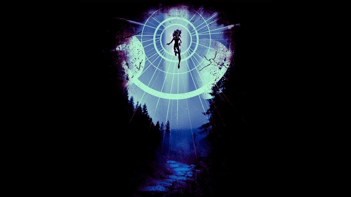 Silhouette of a woman in a beam of light