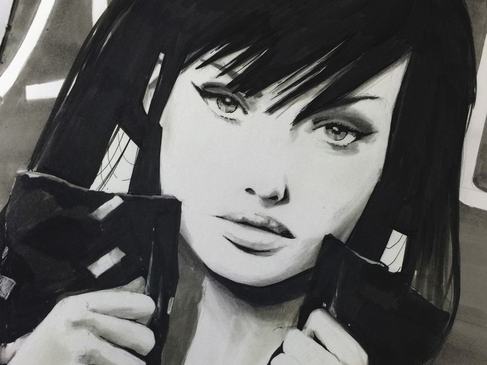 Monochrome portrait of a woman with black hair