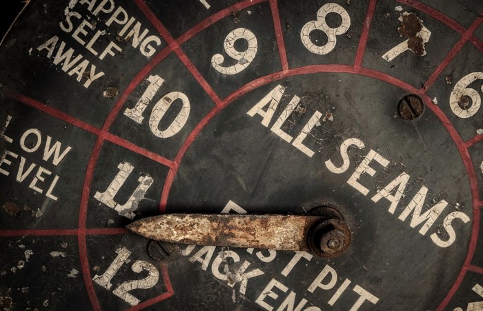 Close-up of a vintage dial with numbers and text