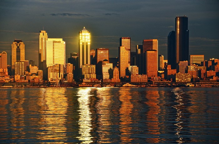 Seattle skyline at sunset over the water