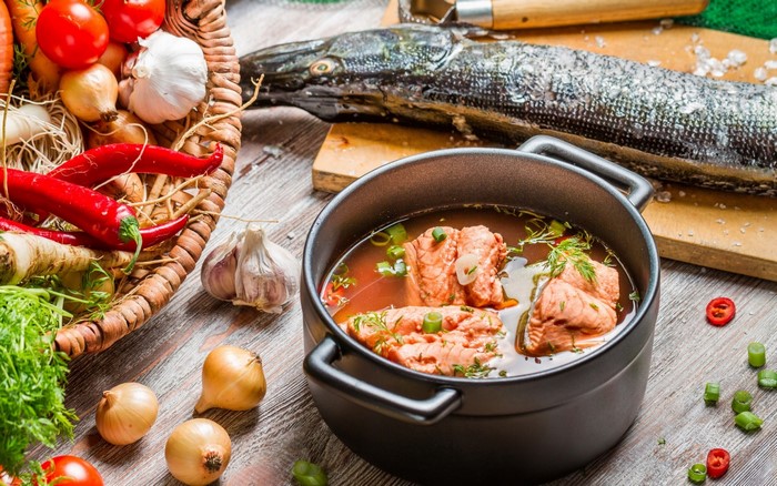 Fish soup with vegetables and herbs