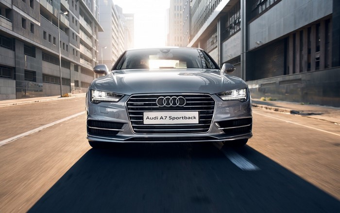 Audi A7 Sportback driving on city street