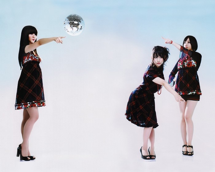 Perfume members Achan, Kashiyuka, and Nocchi with disco ball