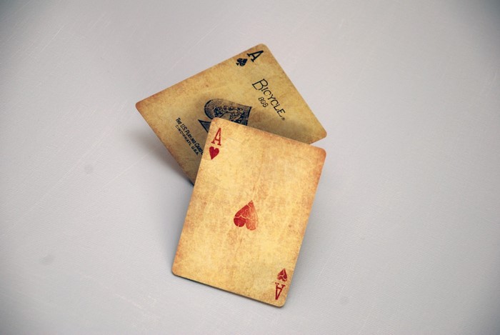 Two vintage Ace of Spades playing cards