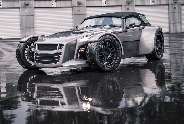 Donkervoort D8 GTO-S sportscar on wet asphalt