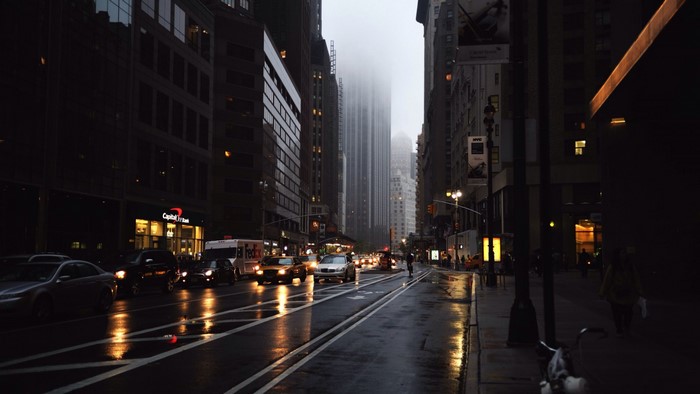 Foggy Evening in a Busy Downtown City Street