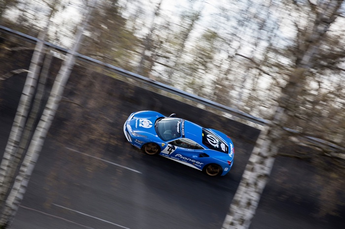 Blue Ferrari 488 GTB race car on track