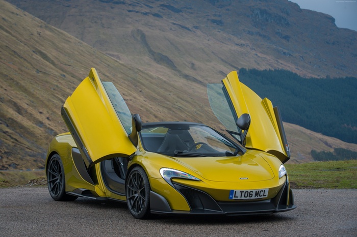 Yellow McLaren 675LT Spider with doors open