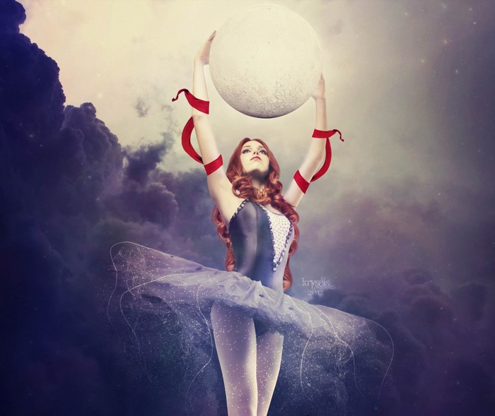 Ballerina holding the moon in a cloudy sky