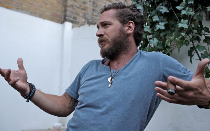 Tom Hardy with beard and tattoos
