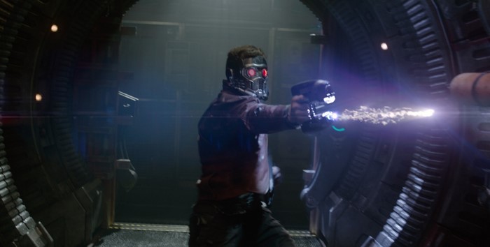 Star-Lord from Guardians of the Galaxy firing a weapon