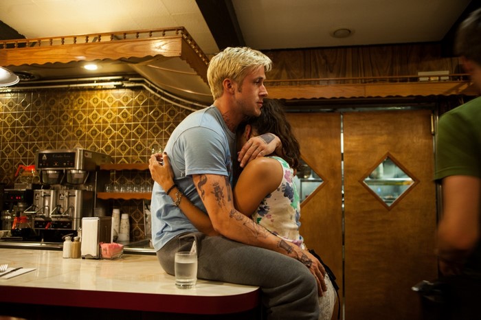 Ryan Gosling and woman in diner