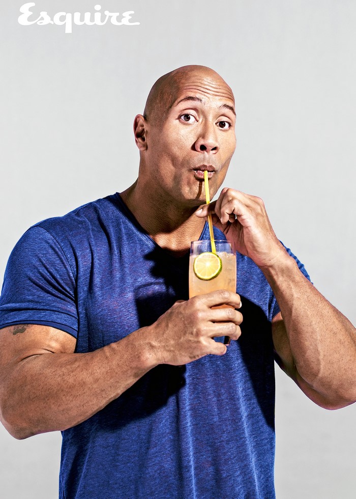 Dwayne Johnson drinking a beverage with Esquire logo
