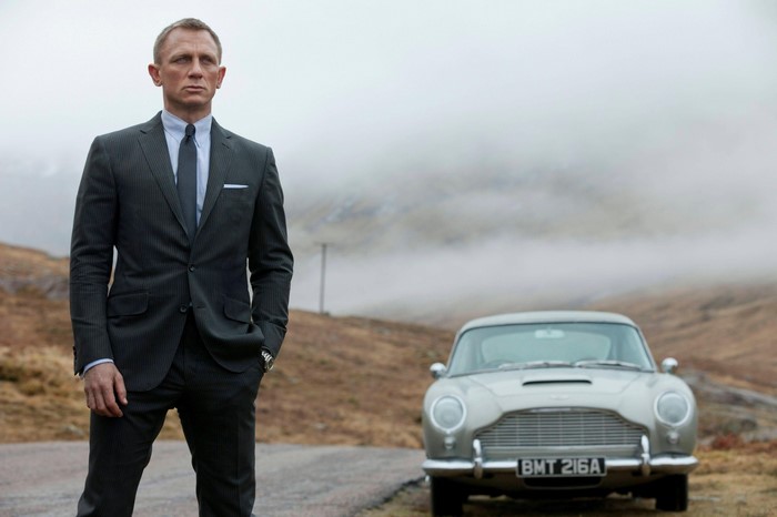 Daniel Craig as James Bond with Aston Martin DB5