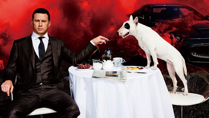 Channing Tatum and dog at a table with a car
