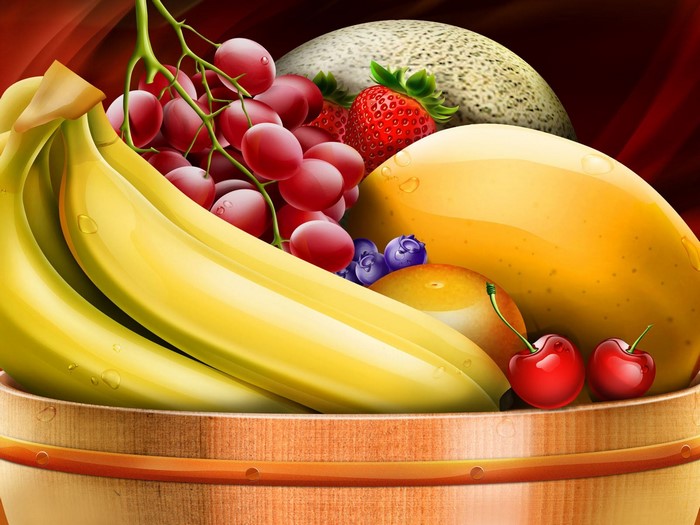 A colorful assortment of fresh fruits in a wooden basket