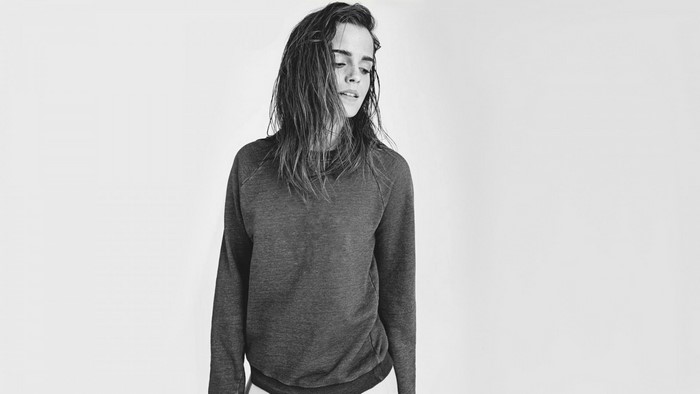 Emma Watson in a dark sweatshirt