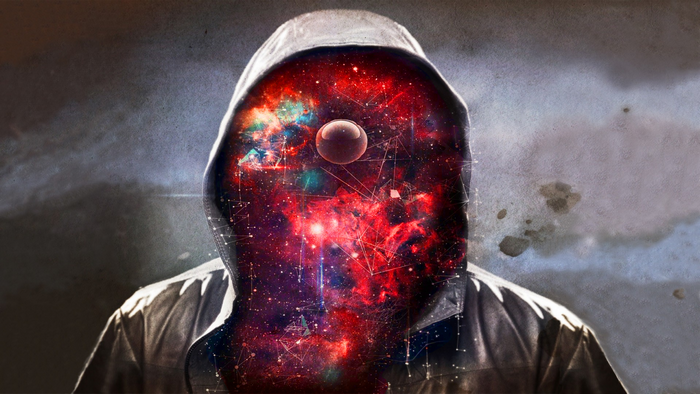 Person in a hood with a galaxy inside their head