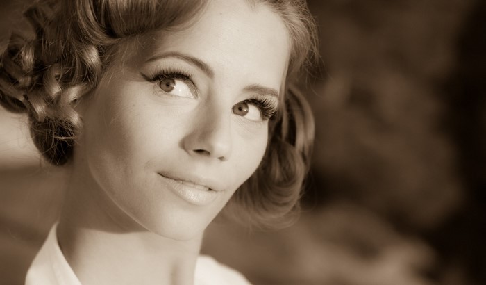 Sepia Portrait of a Smiling Woman with Brown Hair