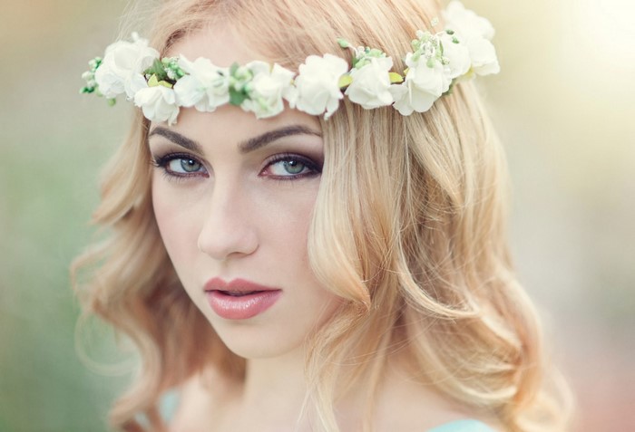 Woman with blonde hair and flower crown