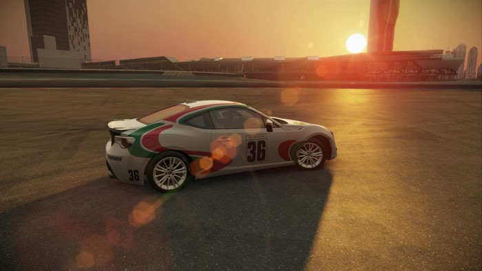 Toyota GT 86 race car on a track at sunset