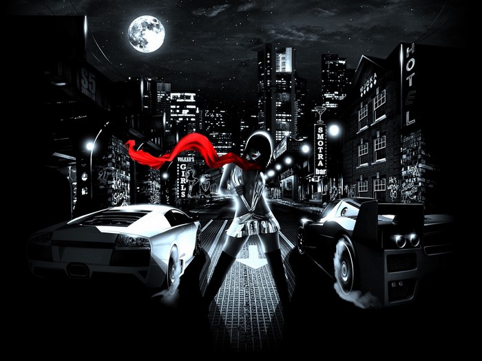 Woman with red scarf and sports cars in a city at night