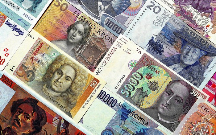Collage of various international banknotes